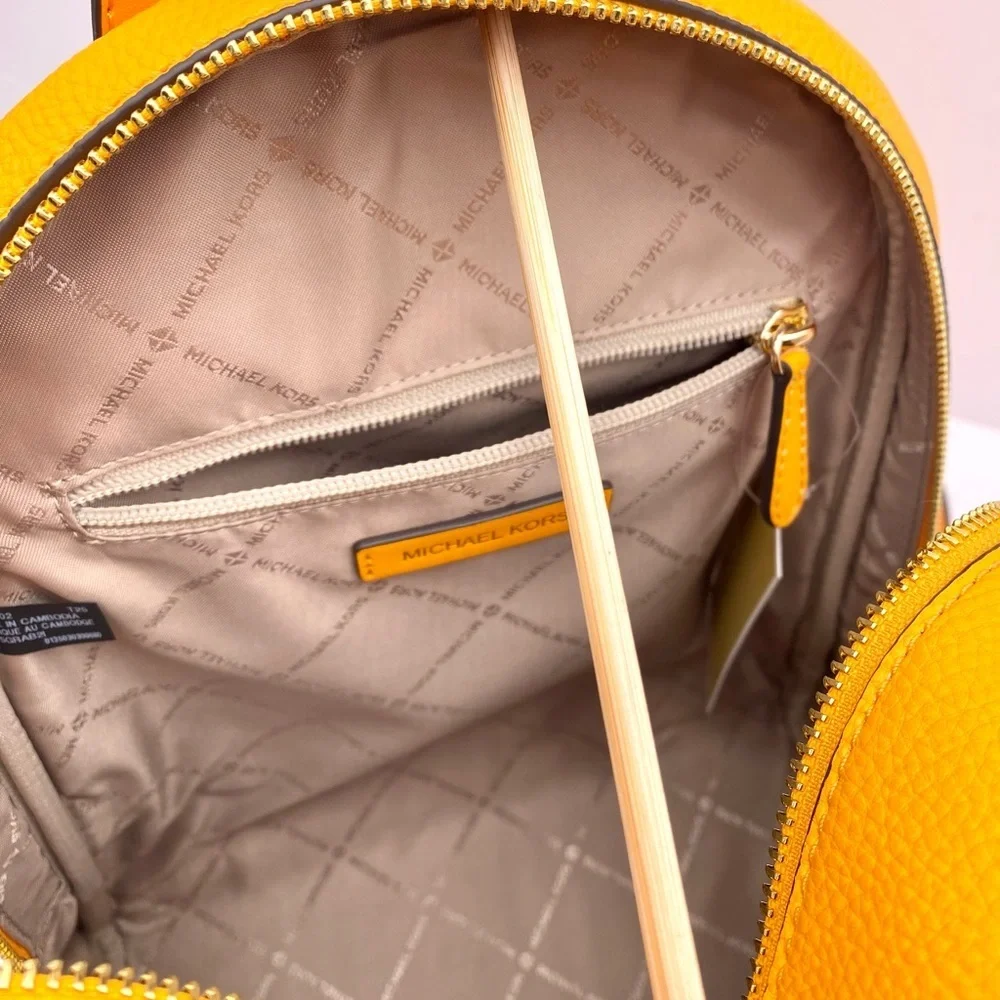 Michael Kors Vibrant Orange Backpack with Fun Patches